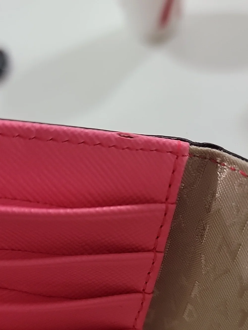 kate spade coral Talk The Talk Imogene Passport Holder Featuring Parrot